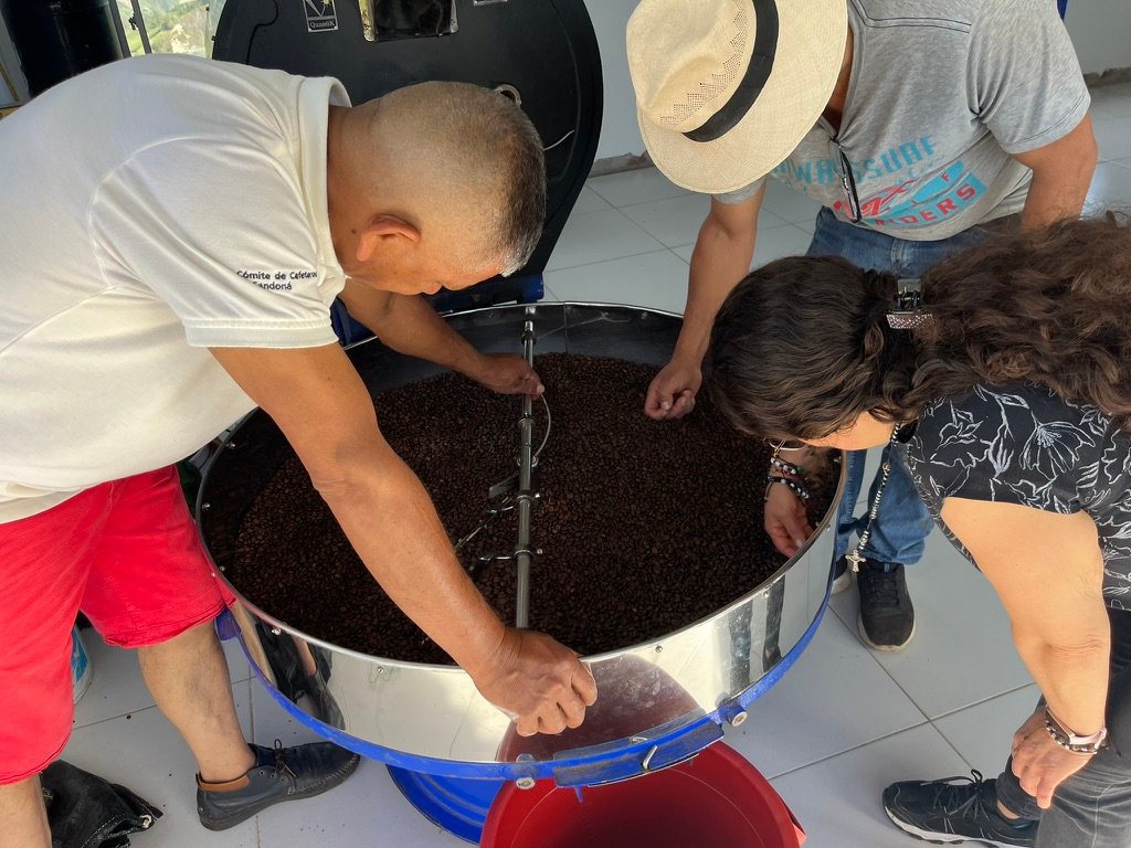 Family around the roasting tray